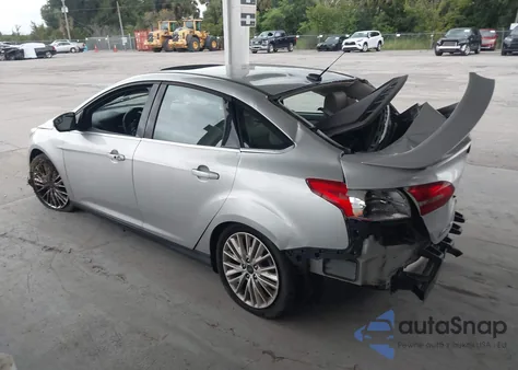 2017 Ford Focus Titanium z USA, uszkodzony, nr VIN 1FADP3J23HL291611